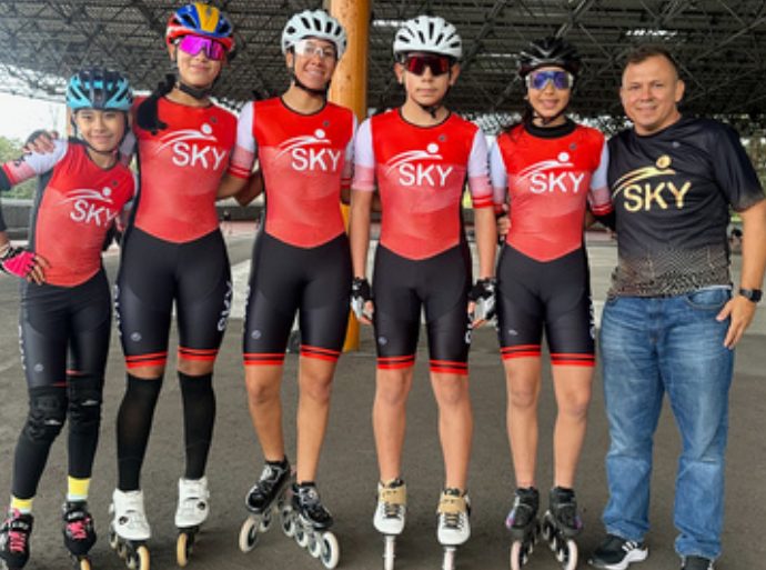Team SKY skaters with the coach